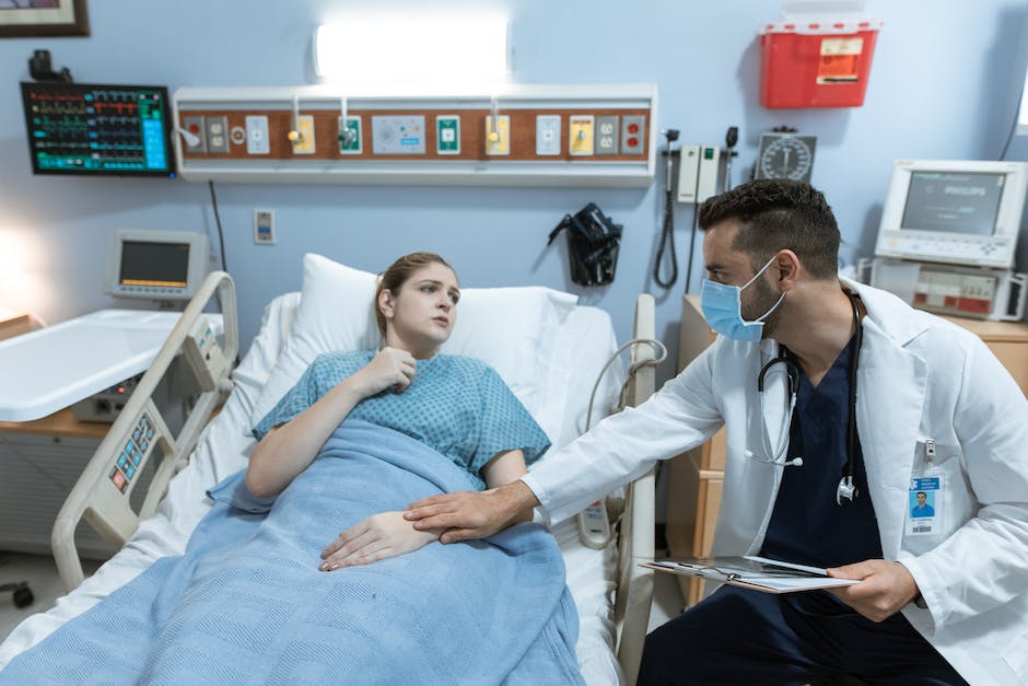 Image depicting a person receiving support and comfort from a healthcare professional