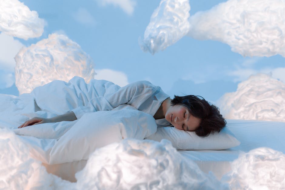 Image depicting the importance of sleep hygiene and routine, showing a person sleeping peacefully with a serene background.