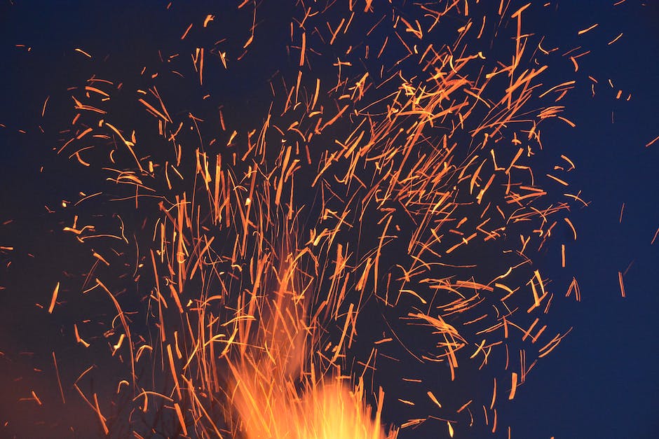 An image of an iPhone overheating with smoke coming out, illustrating the problem of iPhone overheating.