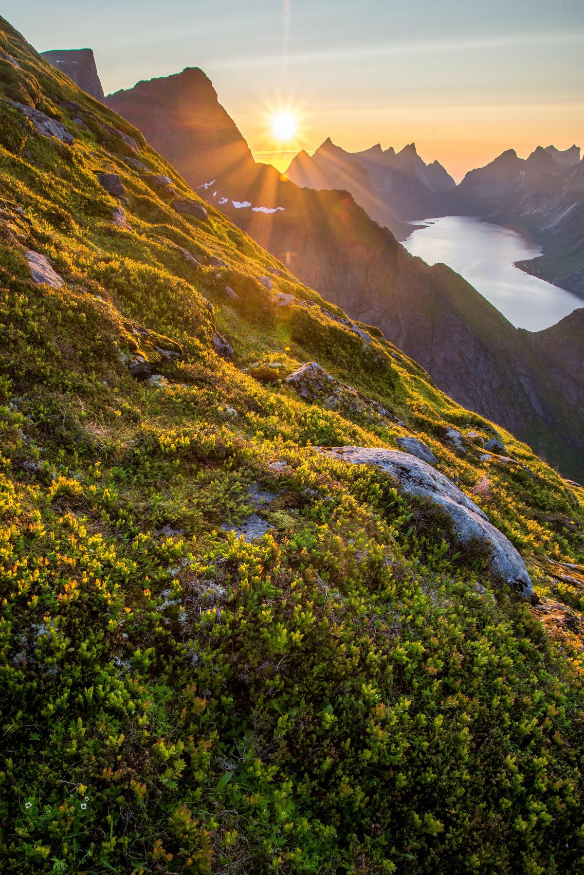 Image description: A person hiking in the mountains.